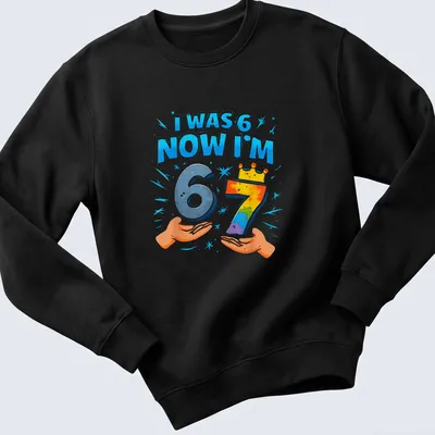 Colorful birthday shirt with playful text celebrating a child's seventh birthday — printed on a sweatshirt