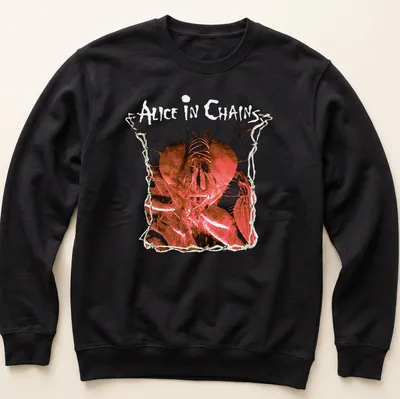 Artistic illustration of a heart with Alice In Chains text in red, black, and white — printed on a unisex sweatshirt
