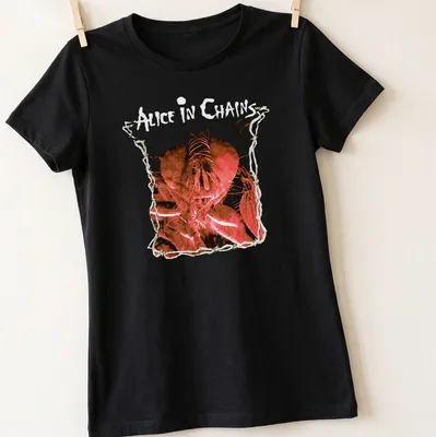 Artistic illustration of a heart with Alice In Chains text in red, black, and white — printed on a women's shirt