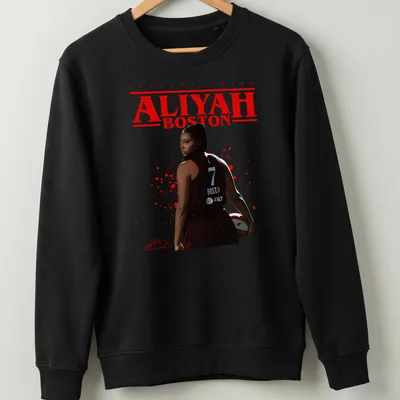 Aliyah Boston basketball t-shirt featuring bold lettering and dynamic illustration — printed on a unisex sweatshirt