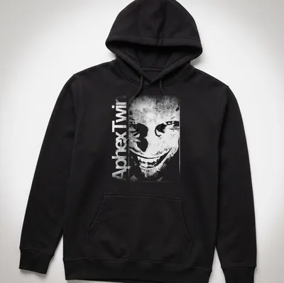 Minimalist Aphex Twin album tee with bold black text on white background — printed on a unisex hoodie