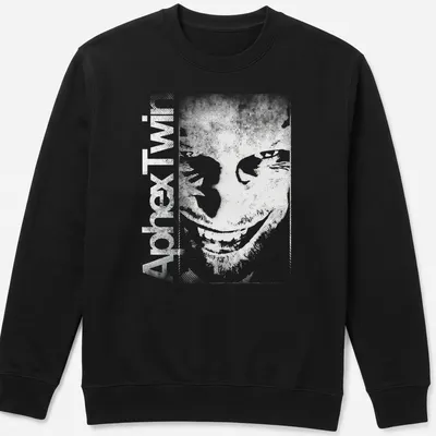 Minimalist Aphex Twin album tee with bold black text on white background — printed on a unisex sweatshirt