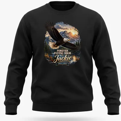 Realistic Bald Eagle soaring with text 'FOREVER FLYING HIGH Jackie 2012 - 2026' — printed on a unisex sweatshirt