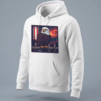 Retro pixel art of a bald eagle against a sunset background — printed on a unisex hoodie