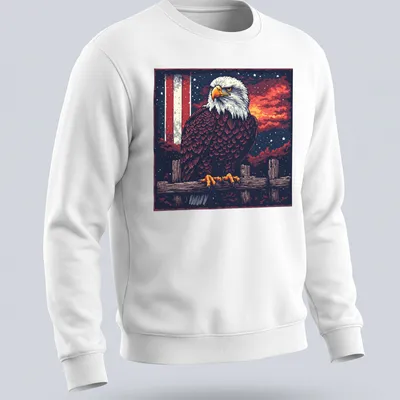 Retro pixel art of a bald eagle against a sunset background — printed on a unisex sweatshirt