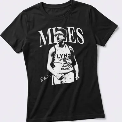 Silhouette of a basketball player in motion, featuring black, white, and orange colors — printed on a women's shirt
