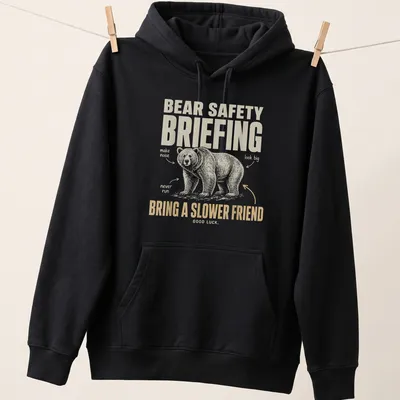 Vintage illustration t-shirt with bear safety briefing text in playful font — printed on a unisex hoodie