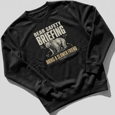 Vintage illustration t-shirt with bear safety briefing text in playful font — printed on a unisex sweatshirt