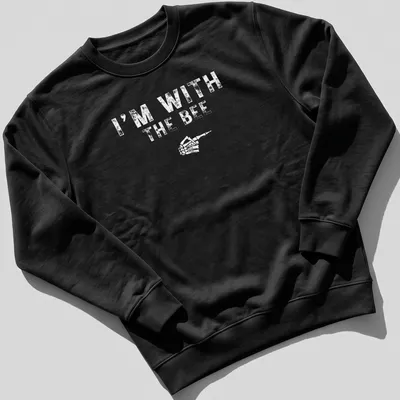 Playful cartoon bee design with text I'm With The BEE for Halloween — printed on a unisex sweatshirt