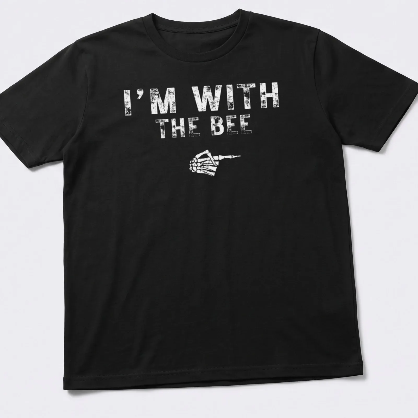 Playful cartoon bee design with text I'm With The BEE for Halloween — printed on a unisex t-shirt