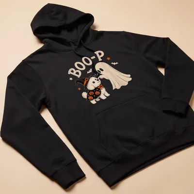 Cute cartoon Bichon Frise dressed as a ghost with 'BOO-P' text. — printed on a unisex hoodie