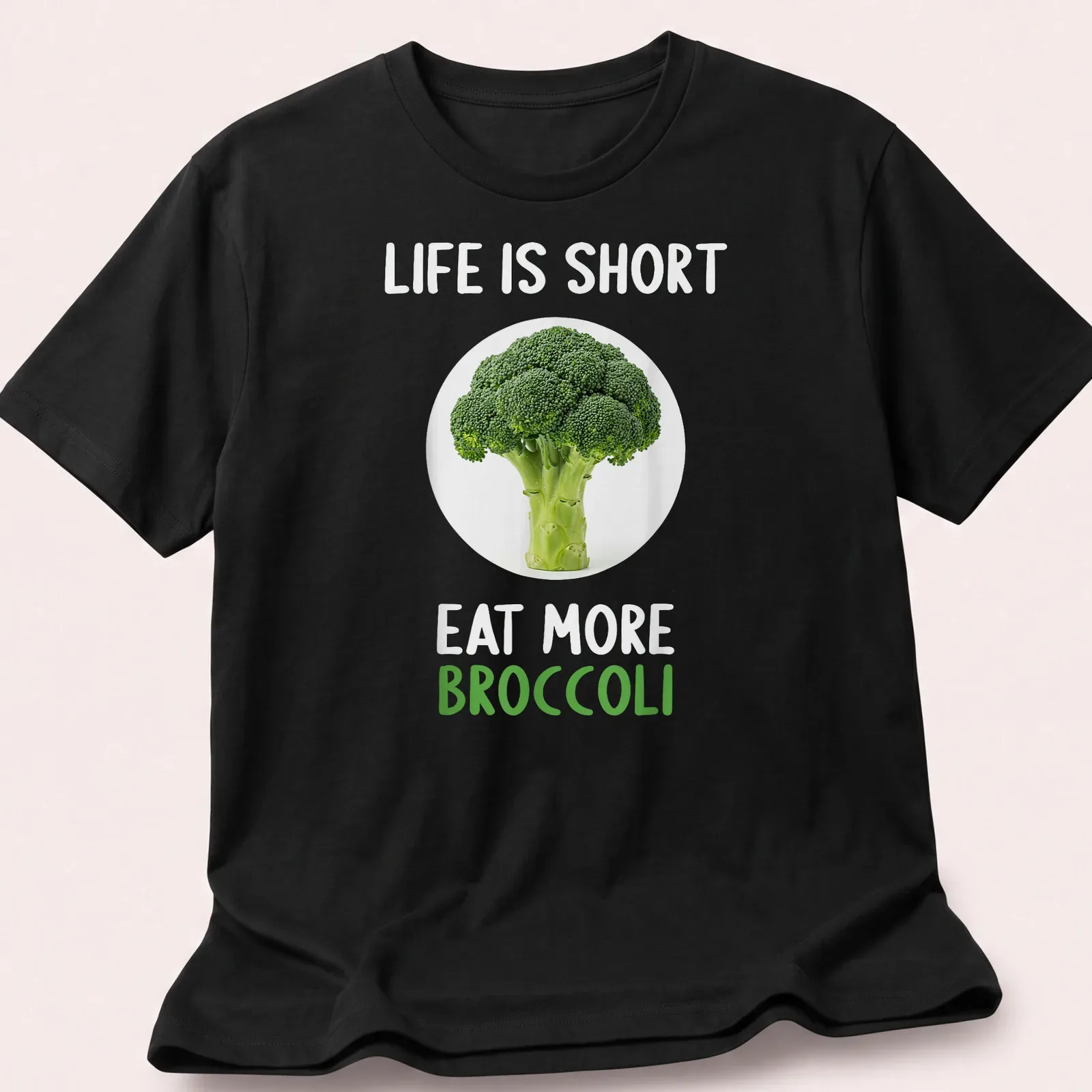 Modern shirt with a clean design featuring broccoli and humorous text about eating more vegetables — printed on a unisex t-shirt