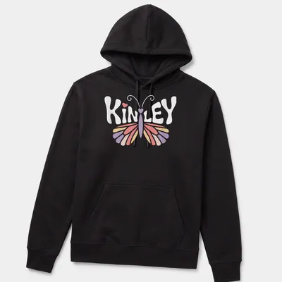 Vintage t-shirt with the name Kinley and a butterfly design in pastel colors — printed on a unisex hoodie