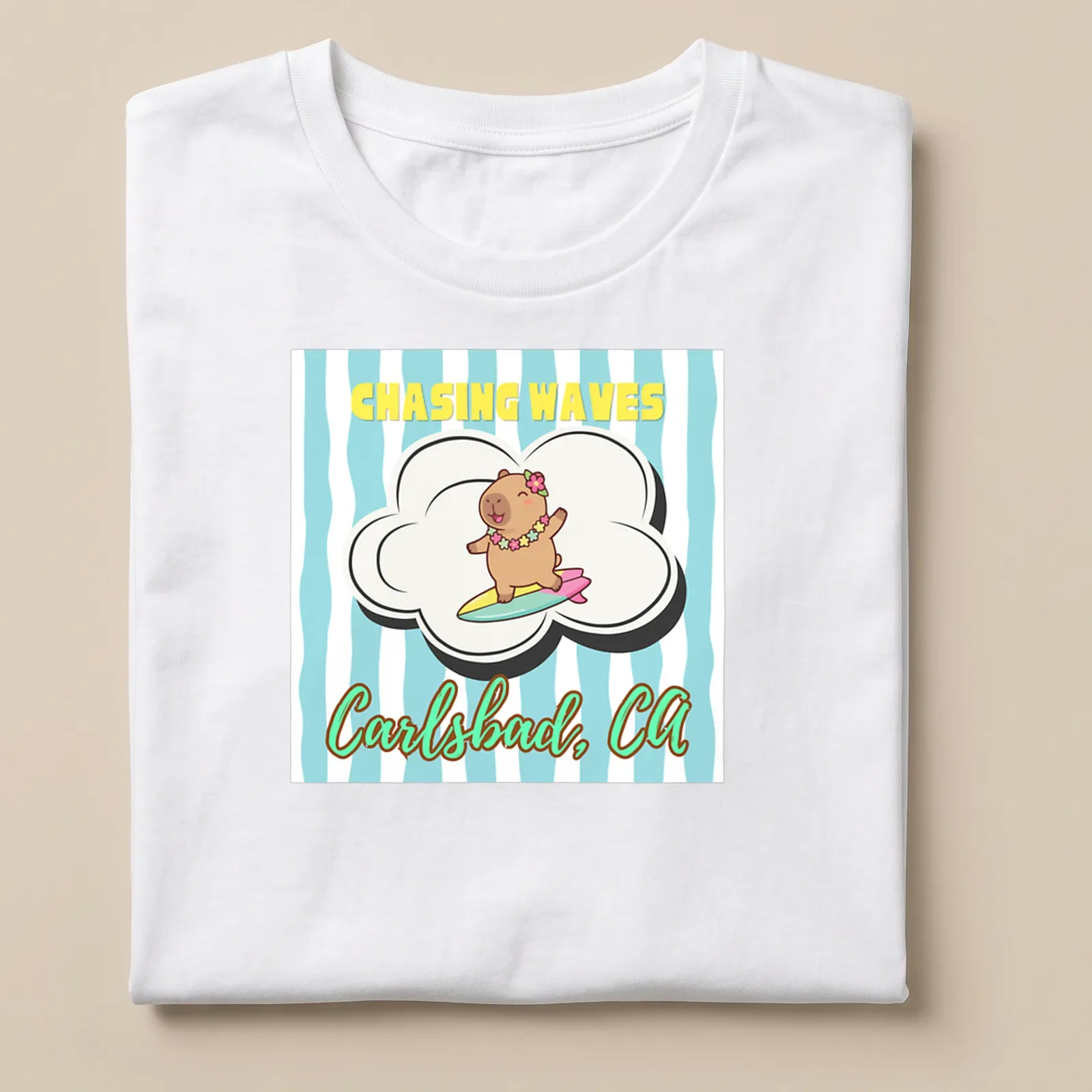 Cute cartoon capybara surfing with cheerful colors and text — printed on a unisex t-shirt