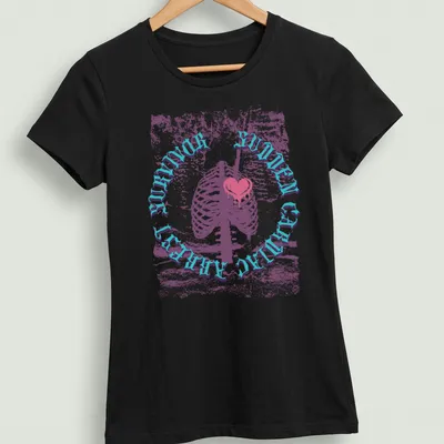 Vintage distressed shirt featuring a skeleton holding a heart with quirky text. — printed on a women's shirt