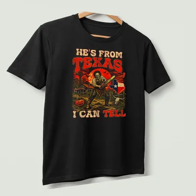 Vintage horror t-shirt featuring chainsaw-wielding figure with text about Texas. — printed on a unisex t-shirt (angled view)