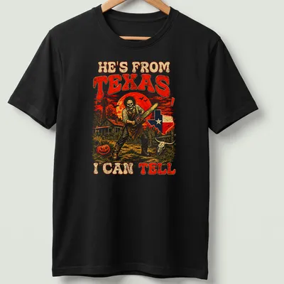 Vintage horror t-shirt featuring chainsaw-wielding figure with text about Texas.