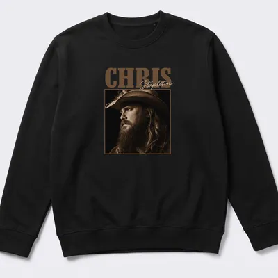 Vintage sepia t-shirt featuring Chris Stapleton's name in bold lettering — printed on a unisex sweatshirt