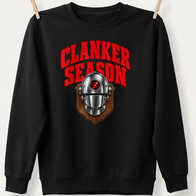 Bold graphic of a robot head with the text CLANKER SEASON in red and silver — printed on a unisex sweatshirt