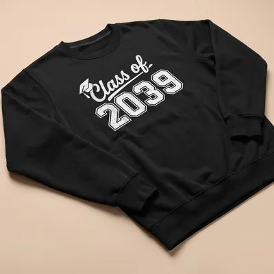 Retro distressed shirt featuring a graduation cap and Class of 2039 text — printed on a unisex sweatshirt