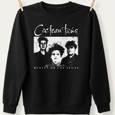 Vintage Cocteau Twins t-shirt with black and white text and stylish font — printed on a unisex sweatshirt