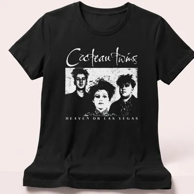 Vintage Cocteau Twins t-shirt with black and white text and stylish font — printed on a women's shirt