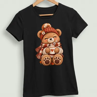 Kawaii illustration of a cozy teddy bear with coffee, featuring warm autumn colors — printed on a women's shirt