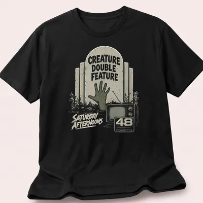 Vintage horror t-shirt featuring a zombie hand and retro television design