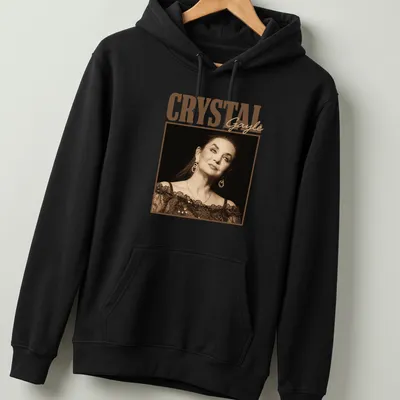 Vintage portrayal of Crystal Gayle in warm tones with her name printed — printed on a unisex hoodie