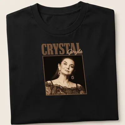 Vintage portrayal of Crystal Gayle in warm tones with her name printed