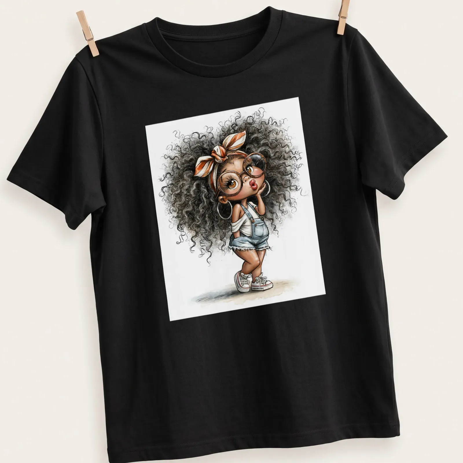 Watercolor illustration of a cute Afro girl in denim overalls — printed on a unisex t-shirt