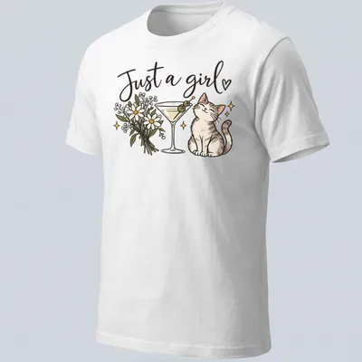 Kawaii line-art of a cute cat with a martini and text below it reading 'Just a girl' — printed on a unisex t-shirt