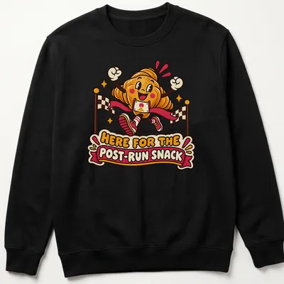 Kawaii cartoon croissant character running with the text about post-run snacks. — printed on a unisex sweatshirt