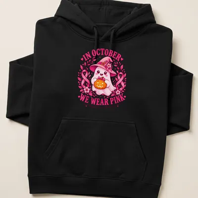Kawaii-style ghost holding a pumpkin with text about breast cancer awareness in pink and orange — printed on a unisex hoodie