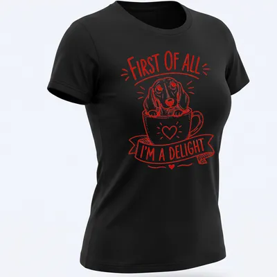 Red line-art design featuring a Dachshund and the phrase 'First of All I'm A Delight' — printed on a women's shirt