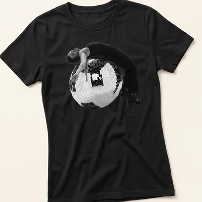 Retro music t-shirt featuring a disco ball in black, white, and silver — printed on a women's shirt