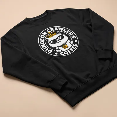 Bold design of a crowned cat wearing sunglasses with coffee-themed text — printed on a unisex sweatshirt