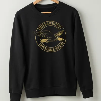 Gold eagle emblem with Pratt & Whitney Dependable Engines text — printed on a unisex sweatshirt