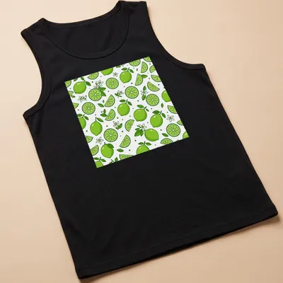 Seamless pattern of green limes and slices on a white background. — printed on a tank top