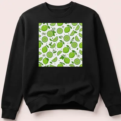 Seamless pattern of green limes and slices on a white background. — printed on a unisex sweatshirt