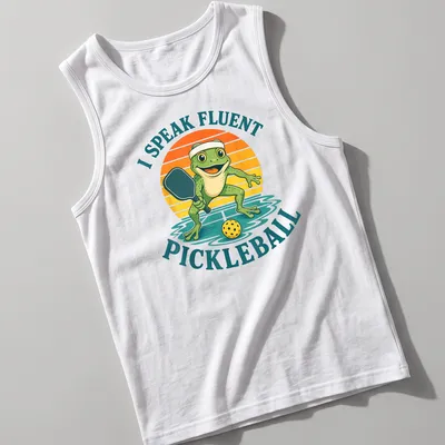 Vintage cartoon frog t-shirt featuring the phrase 'I Speak Fluent Pickleball' in colorful lettering — printed on a tank top