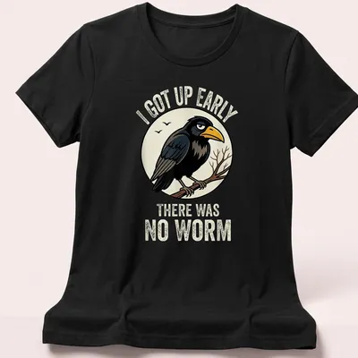 Vintage-style shirt featuring a cartoon bird with text about waking up early without a worm — printed on a women's shirt