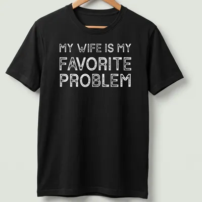 Bold typography T-shirt with the text 'MY WIFE IS MY FAVORITE PROBLEM' in white