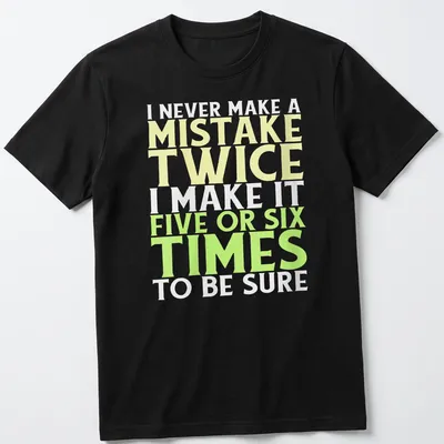 Bold typography t-shirt with funny mistake quote in yellow, green, and white