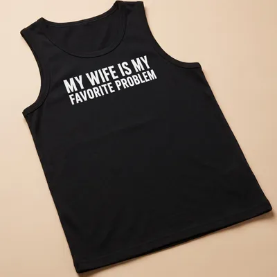 Funny typography shirt with the phrase 'MY WIFE IS MY FAVORITE PROBLEM' in bold text — printed on a tank top