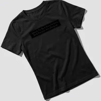Handwritten t-shirt featuring the quote 'I Want To Be A Nice Person But People Are Stupid' in black and white. — printed on a women's shirt