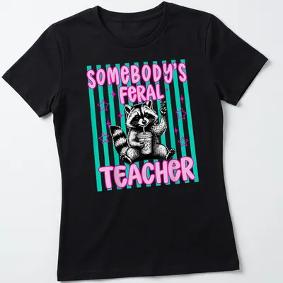 Cartoon raccoon with text 'Somebody's Feral Teacher' in pink, black, teal, and white — printed on a women's shirt
