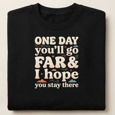 Playful typography t-shirt with the saying 'ONE DAY you’ll go FAR & I hope you stay there' in colorful bubble letters — printed on a unisex sweatshirt