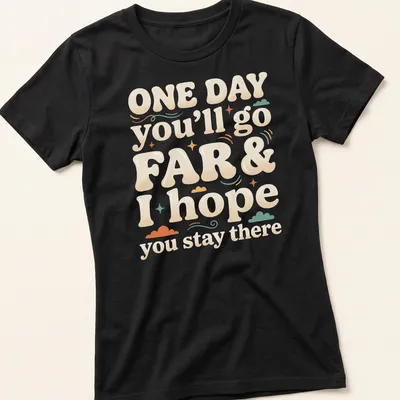 Playful typography t-shirt with the saying 'ONE DAY you’ll go FAR & I hope you stay there' in colorful bubble letters — printed on a women's shirt