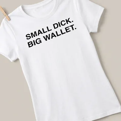 Bold typography shirt with the phrase Small Dick Big Wallet printed in black and white — printed on a women's shirt
